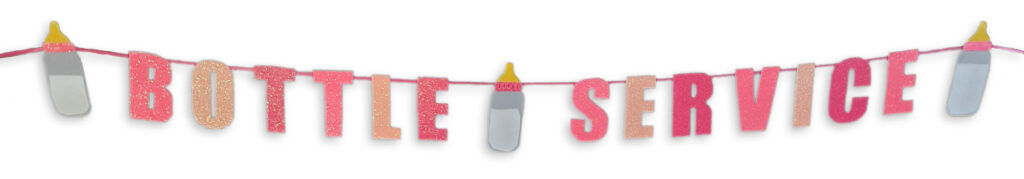 Handmade bottle garland crafted from pink glitter cardstock, hanging as festive party décor.