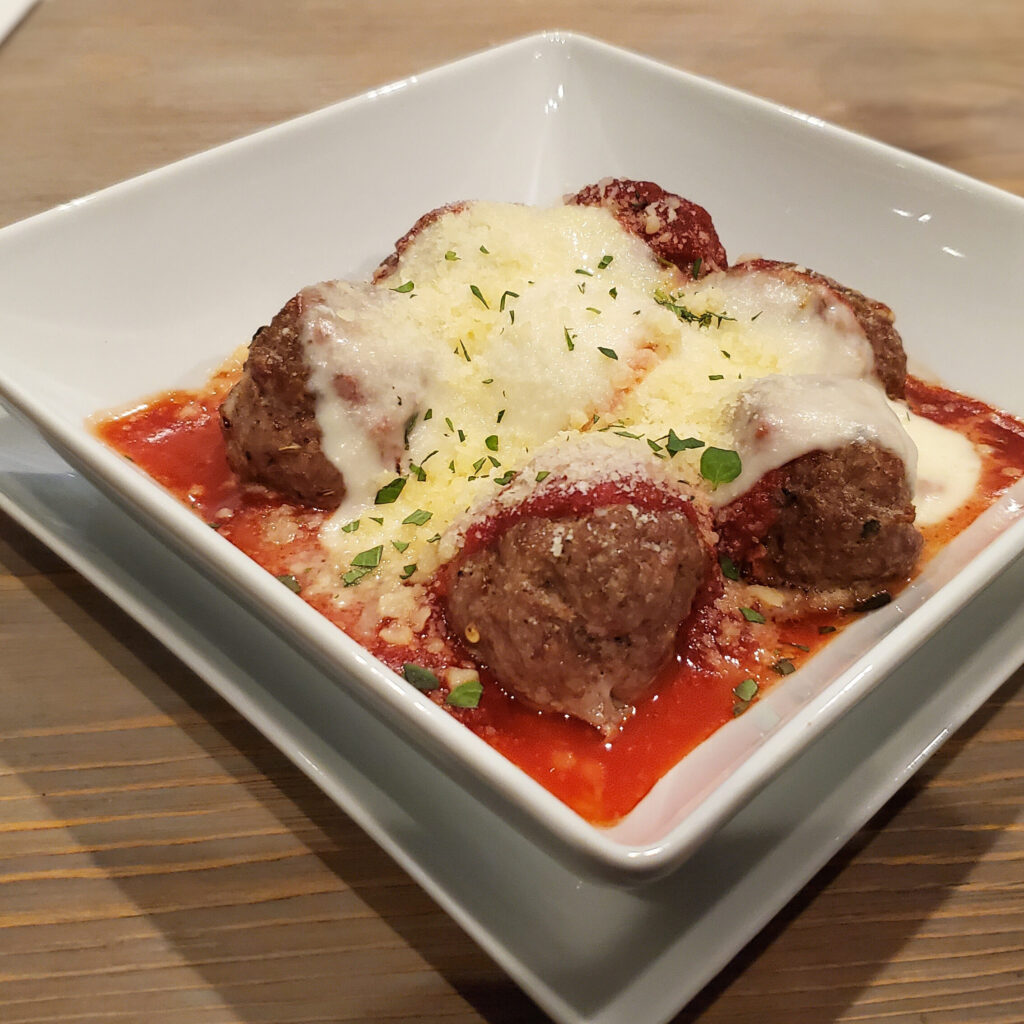 Tender beef and pork meatballs served without pasta, showing versatility beyond zoodles.