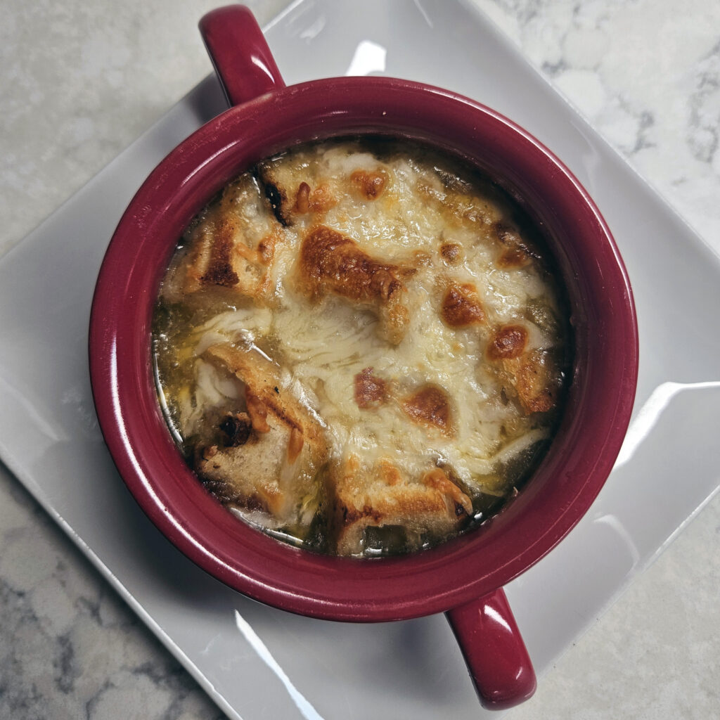 Cheese bubbling and lightly browned under the broiler.