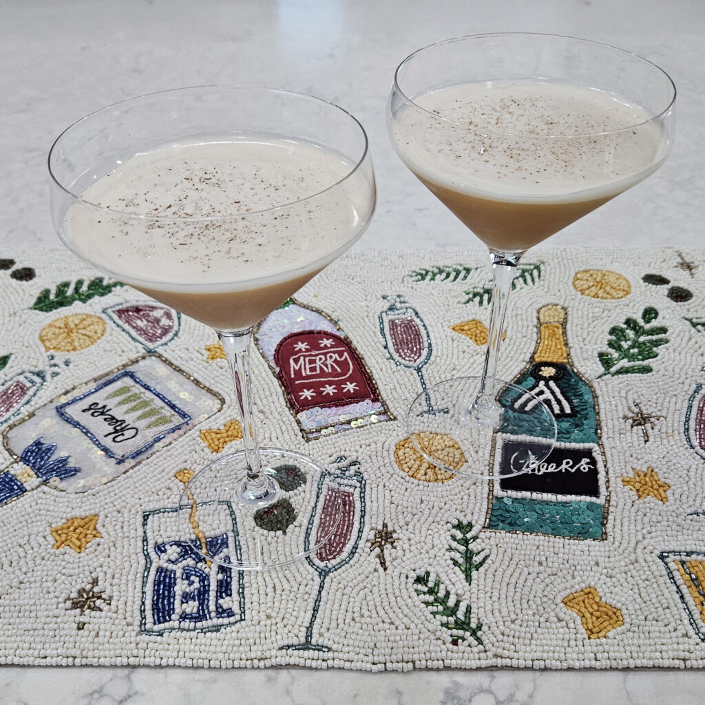 Silent Nightcap cocktail served in a coupe glass with frothy egg white foam.